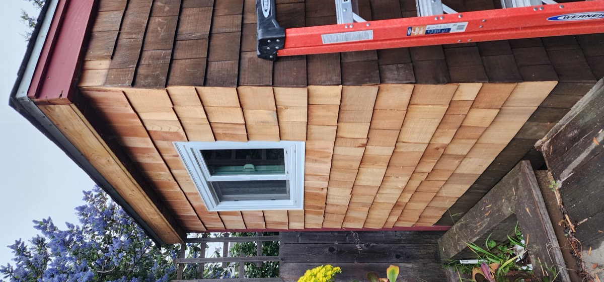 Cedar shingle exterior detail showing craftsmanship on residential home
